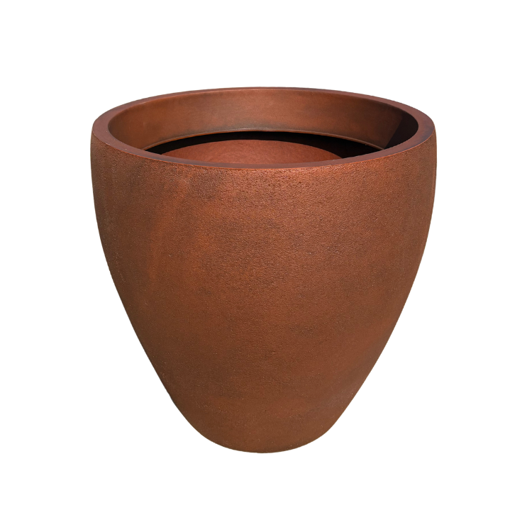 The Rustic Ellipse Japi Planter by Florastyle By Hingham features a large, round, terra-cotta color and smooth finish with a wide opening—perfect for statement planting. Shown against a white background.