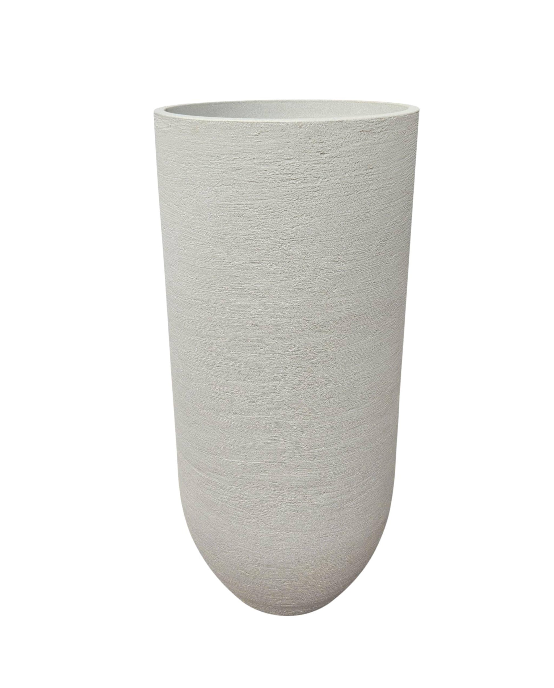 European Verticale Japi Planter, Tall and sleek textured finish. Beautiful complement to any decor. Adds height  and elegance. Florastyle by Hingham.  Sandstone colour. 