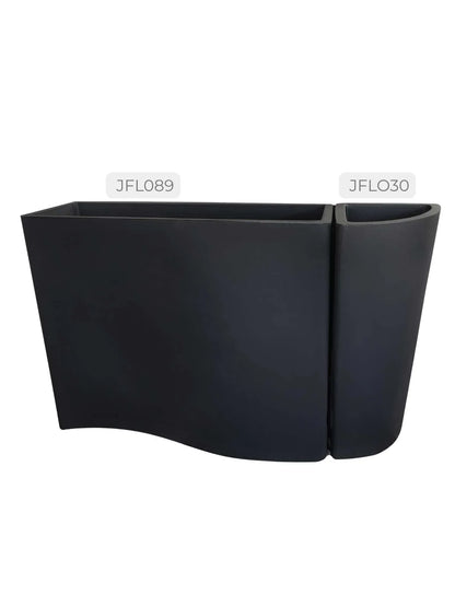 Black planters one is a box shape with a wavy curve, the other is a planter that fits on the end to fill the corner.