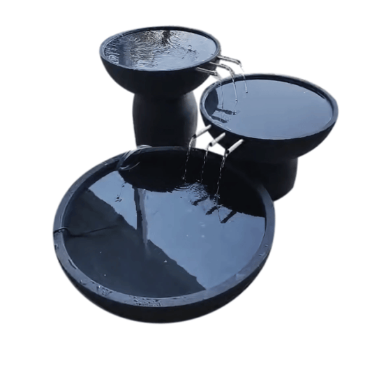 The Florastyle By Hingham Water Feature - 3 Tier European Bowl with Large Pond is a weatherproof polyresin garden fountain with round black (Lead) bowls on two elevated tiers, cascading water into a spacious lower basin, elegant against a white background. Made from polyresin, durable and waterproof, yet lightweight.
Colour: Lead
Price: R6925