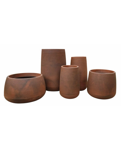 the full range of 5 bios Japi planters in the colour corten steel
