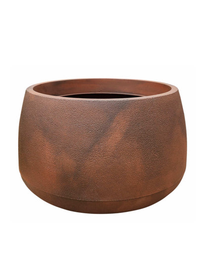 Side view of the Bios Low Japi planter in the colour Corten Steel. Showing the beautiful marbled colour and slight texure of the pot