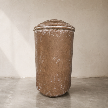 The Damascus Organic Fiberglass Pot - Earth Range by Florastyle By Hingham features a tall, weathered cylindrical design with a fitted lid, making it perfect for modern interiors.