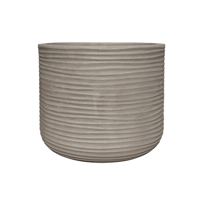 A round, gray Lagoon Round Japi Planter by Florastyle By Hingham features a modern horizontal ribbed texture and is crafted from durable polyresin, shown here on a white background.