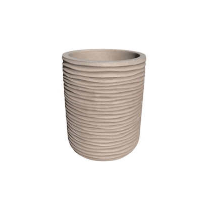 The Lagoon Tall Japi Planter by Florastyle By Hingham is a beige, cylindrical polyresin planter featuring a textured, horizontal ribbed pattern, displayed against a white background.