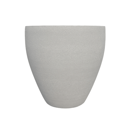 The Florastyle By Hingham Rustic Ellipse Japi Planter is a large, lightweight, light gray pot with a smooth, subtly textured, rounded and tapered shape—ideal for modern plant lovers seeking contemporary style.