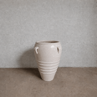 The Athens Organic Fiberglass Pot - Earth Range by Florastyle By Hingham, featuring two handles and horizontal ridges, brings the timeless elegance of ancient Greek pottery to your space with its large light beige design.