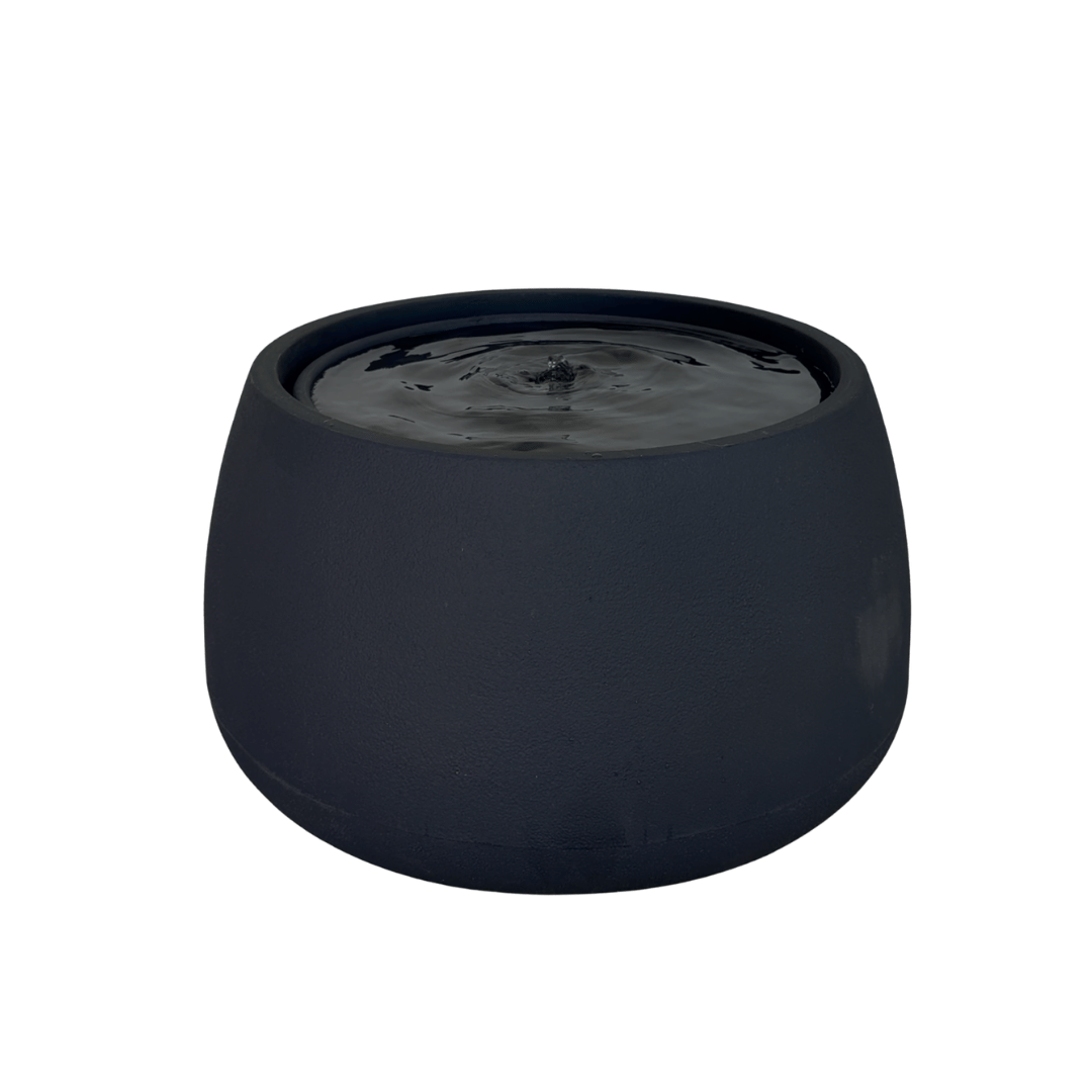 The Florastyle By Hingham Water Feature - Bios Low is a round, black, matte-finished basin with gentle ripples on the water surface, creating a modern accent against a crisp white background. Made from polyresin, durable and waterproof, yet lightweight. Suitable for indoor and outdoor spaces.
Colour: Lead
Price: R5195
