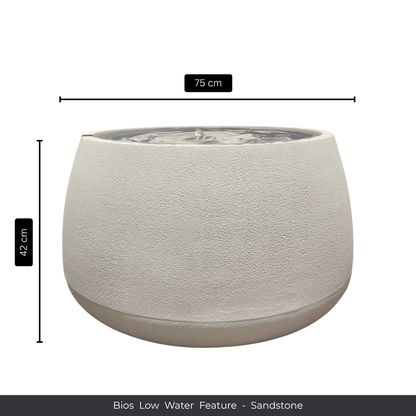 A round, sandstone-toned indoor water feature with a textured finish, 75 cm wide and 42 cm tall, holds water and a central fountain. Text below reads: “Florastyle By Hingham Water Feature - Bios Low”. Made from polyresin, durable and waterproof, yet lightweight. Suitable for indoor and outdoor spaces.
Colour: Sandstone
Price: R5195