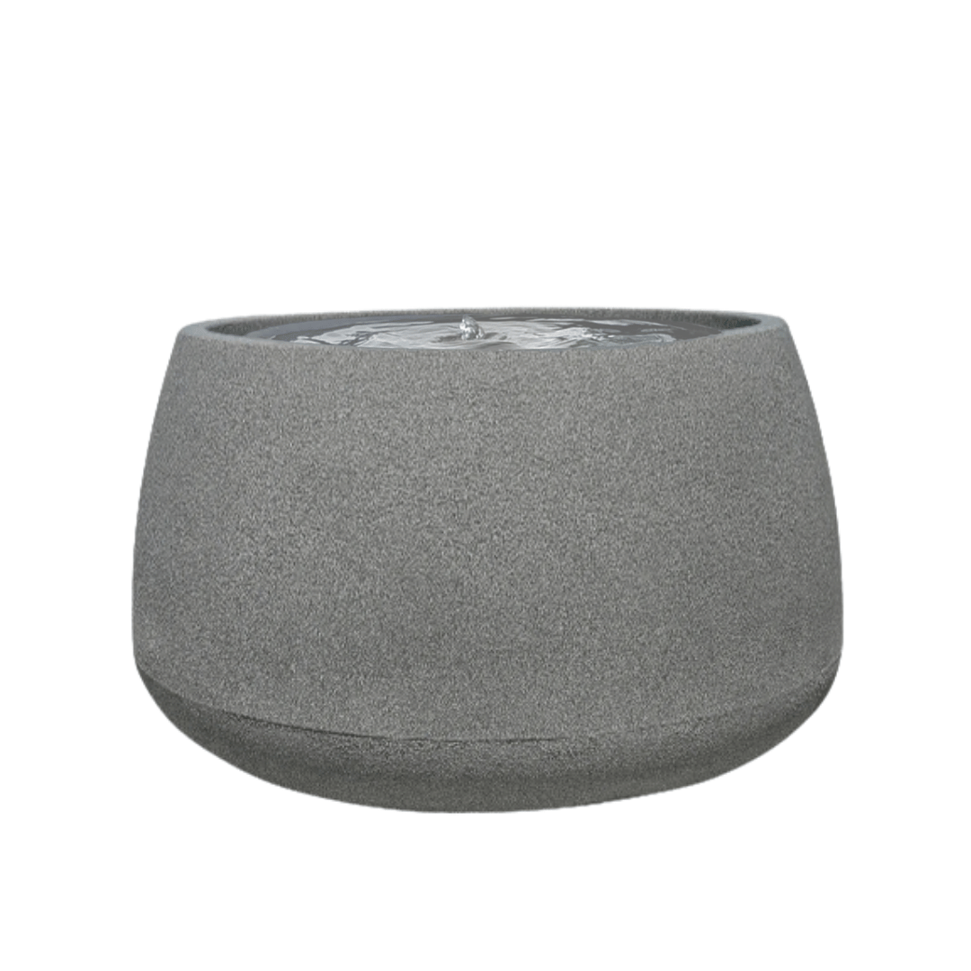 The Water Feature - Bios Low by Florastyle By Hingham is a round, gray stone-finish indoor fountain with a smooth, minimalist design and gently rippling water on its flat top surface. Made from polyresin, durable and waterproof, yet lightweight. Suitable for indoor and outdoor spaces.
Colour: Stone
Price: R5195