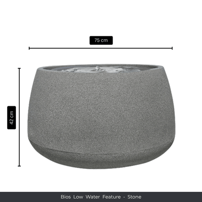 A round, gray stone indoor fountain with water bubbling at the top. Measures 75 cm wide and 42 cm tall. Florastyle By Hingham Water Feature - Bios Low. Made from polyresin, durable and waterproof, yet lightweight. Suitable for indoor and outdoor spaces.
Colour: Stone
Price: R5195