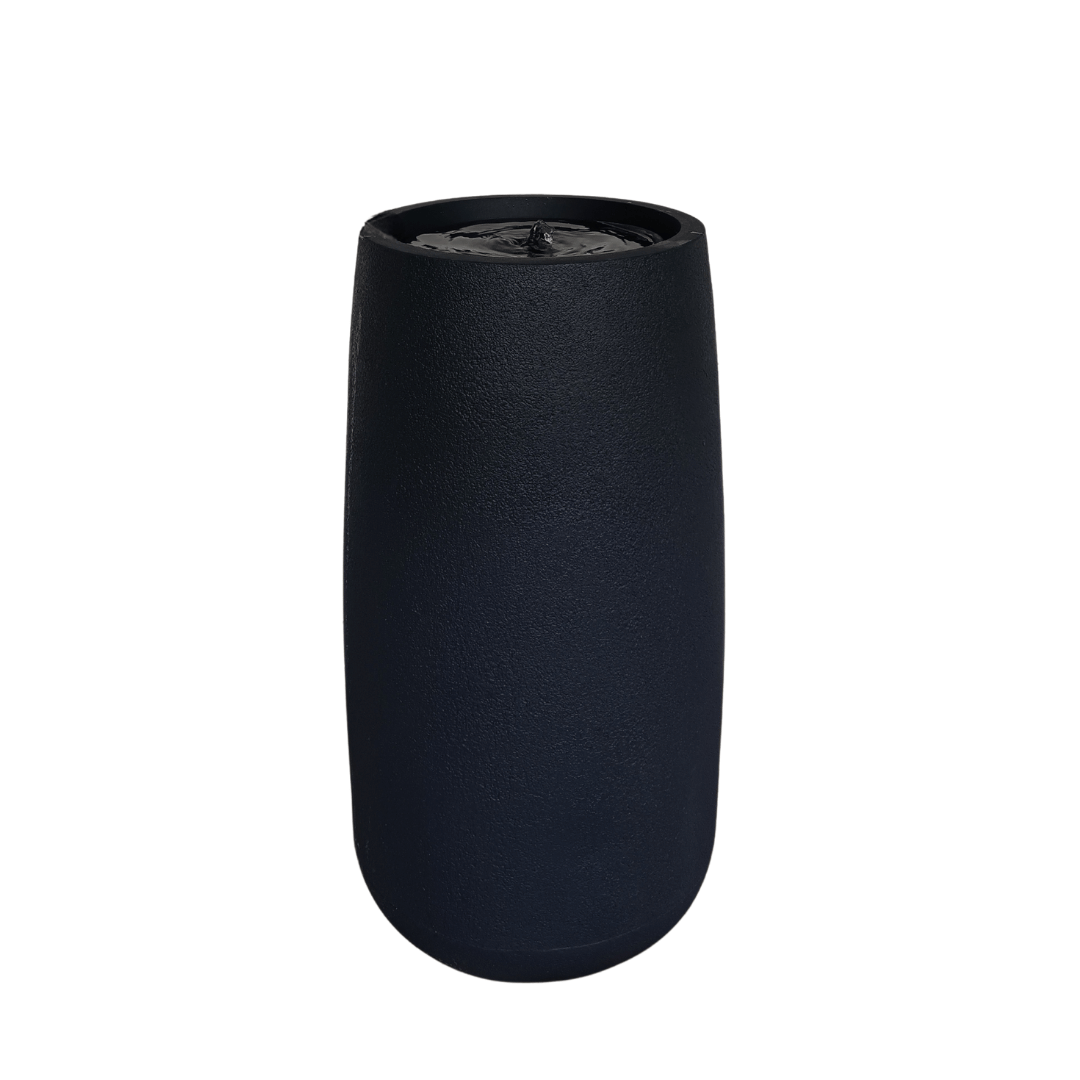 The Florastyle By Hingham Water Feature - Bios Tall Medium is a modern, cylindrical outdoor decor piece with a textured black surface and covered top, shown against a plain white background. Made from polyresin, durable and waterproof, yet lightweight. Suitable for indoor and outdoor spaces.
Colour: Lead
Price: R4675