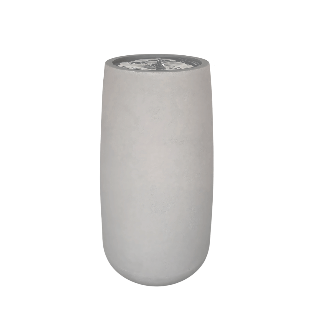 The Water Feature - Bios Tall Medium by Florastyle By Hingham is a tall, cylindrical, light gray stone fountain with a smooth surface and gently bubbling water, ideal as a modern garden decor piece. Made from polyresin, durable and waterproof, yet lightweight. Suitable for indoor and outdoor spaces.
Colour: Sandstone
Price: R4675