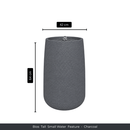 The Florastyle By Hingham Water Feature - Bios Tall Small is a 64 cm tall, 42 cm diameter cylindrical charcoal fountain, perfect as an indoor water feature or a stylish accent for tall planters. Made from polyresin, durable and waterproof, yet lightweight. Suitable for indoor and outdoor spaces.
Colour: Charcoal
Price: R4045