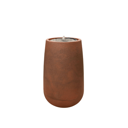 The Florastyle By Hingham Water Feature - Bios Tall Small is a brown, cylindrical indoor tabletop fountain with a stone-like texture, circular opening, and small spout—an elegant piece resembling a tall planter. Made from polyresin, durable and waterproof, yet lightweight. Suitable for indoor and outdoor spaces.
Colour: Corten Steel
Price: R4045