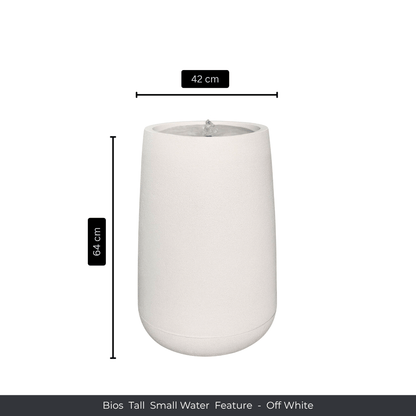 A tall, off-white cylindrical indoor water fountain from Florastyle By Hingham. Standing 64 cm high and 42 cm in diameter, the Water Feature - Bios Tall Small adds elegance to any space. Made from polyresin, durable and waterproof, yet lightweight. Suitable for indoor and outdoor spaces.
Colour: Off White
Price: R4045