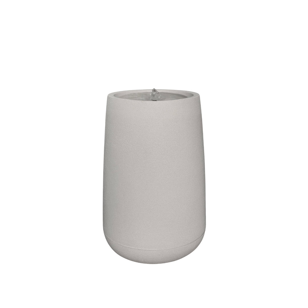 The Florastyle By Hingham Water Feature - Bios Tall Small is a modern cylindrical tabletop fountain in light gray with a smooth surface, featuring water gently bubbling from its center, shown against a plain white background. Made from polyresin, durable and waterproof, yet lightweight. Suitable for indoor and outdoor spaces.
Colour: Sandstone
Price: R4045