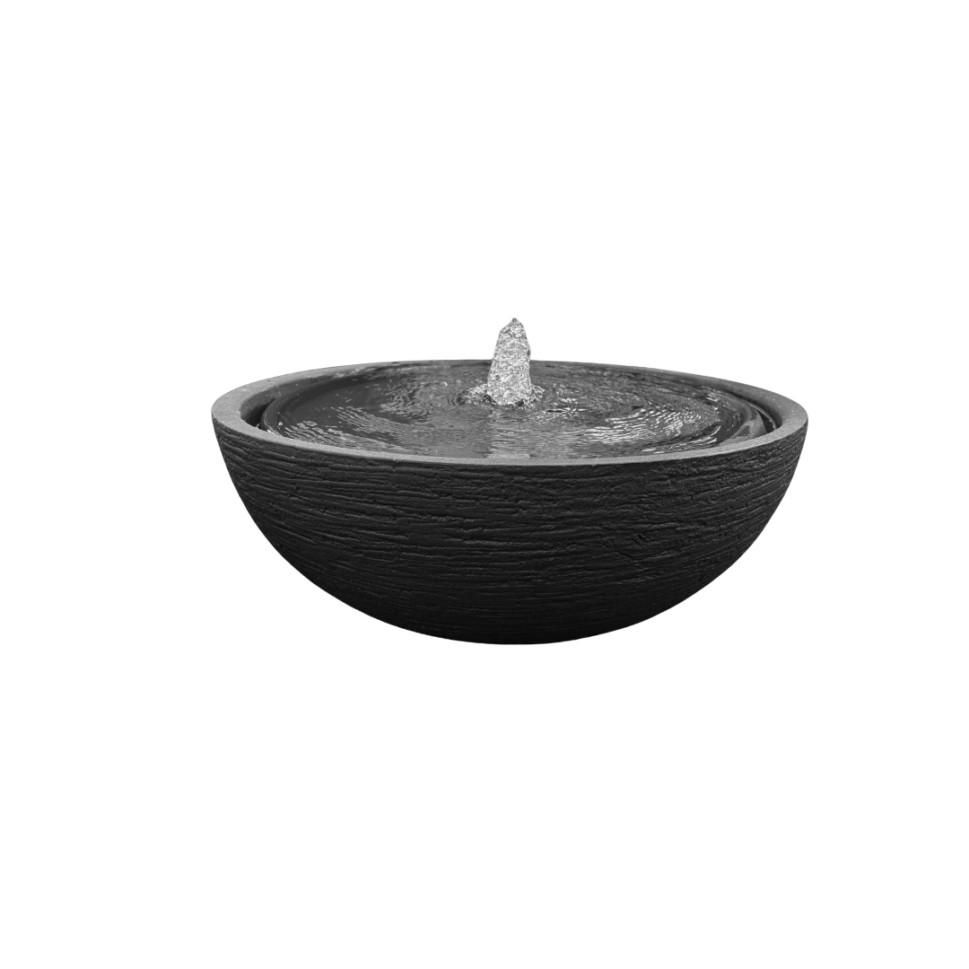 The Water Feature - European Bowl Medium by Florastyle By Hingham is a black, round, textured garden fountain with a central spout, showcased against a white background. Made from polyresin, durable and waterproof, yet lightweight. Suitable for indoor and outdoor spaces.
Colour: Lead
Price: R2995