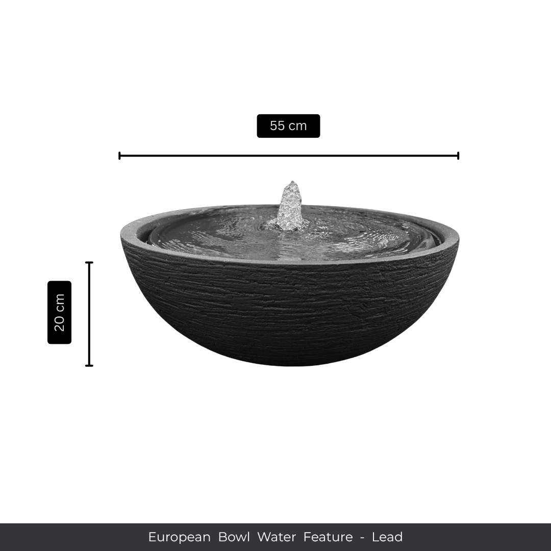 A round, textured black bowl-shaped water feature with central fountain by Florastyle By Hingham, measuring 55 cm wide and 20 cm tall. Text reads: Water Feature - European Bowl Medium. Made from polyresin, durable and waterproof, yet lightweight. Suitable for indoor and outdoor spaces.
Colour: Lead
Price: R2995