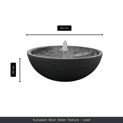 A round, textured black bowl-shaped water feature with central fountain by Florastyle By Hingham, measuring 55 cm wide and 20 cm tall. Text reads: Water Feature - European Bowl Medium. Made from polyresin, durable and waterproof, yet lightweight. Suitable for indoor and outdoor spaces.
Colour: Lead
Price: R2995