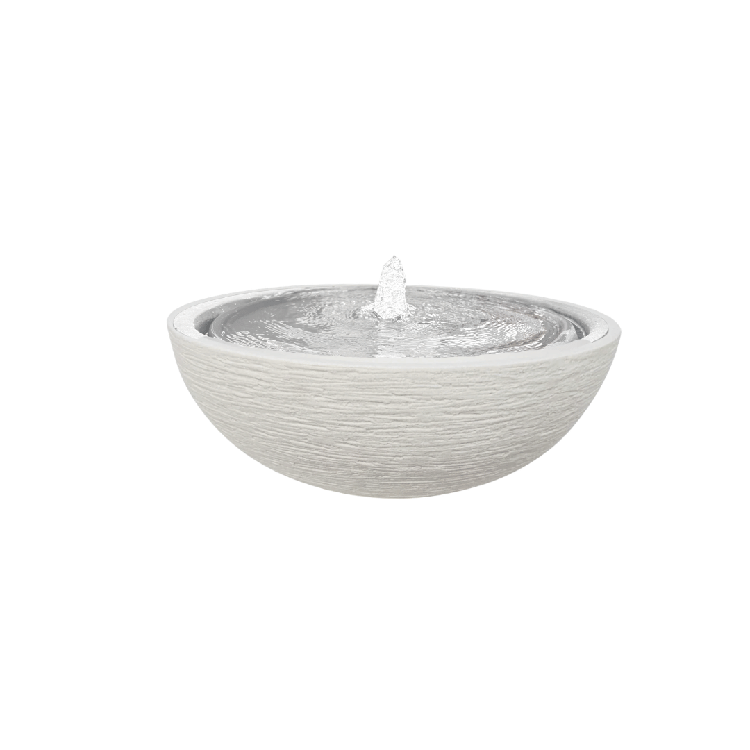 The Florastyle By Hingham Water Feature - European Bowl Medium is a textured white tabletop planter with water bubbling gently from the center, creating ripples across its surface, set against a plain white background. Made from polyresin, durable and waterproof, yet lightweight. Suitable for indoor and outdoor spaces.
Colour: Off White
Price: R2995