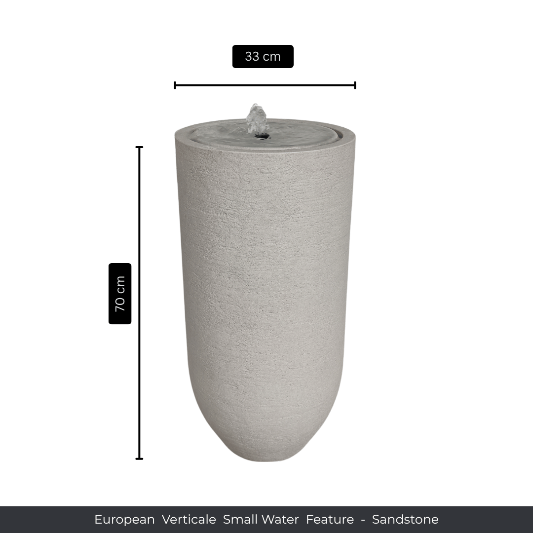 A tall, cylindrical sandstone water fountain by Florastyle By Hingham, 70 cm high and 33 cm in diameter. Text below: Water Feature - European Verticale Small. Made from polyresin, durable and waterproof, yet lightweight. Suitable for indoor and outdoor spaces.
Colour Sandstone
Price: R3465