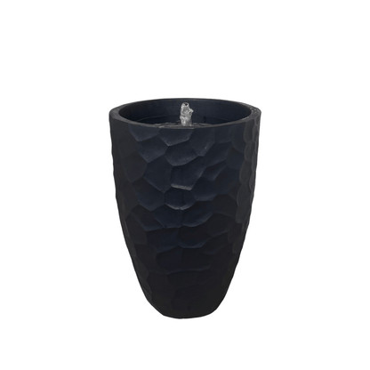 The Florastyle By Hingham Water Feature - Prisma Conic Medium is a tall, black (Lead) polyresin piece with a modern geometric textured pattern and bubbling water from the central top opening, set against a plain white background. Made from polyresin, durable and waterproof, yet lightweight. Suitable for indoor and outdoor.
Colour: Lead
Price: R3095