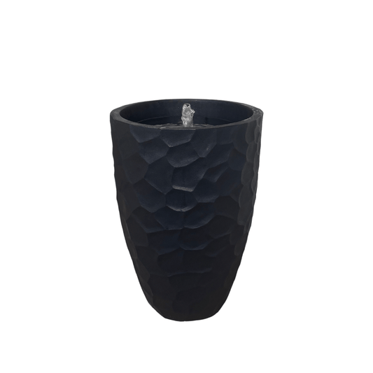 The Florastyle By Hingham Water Feature - Prisma Conic Medium is a tall, black (Lead) polyresin piece with a modern geometric textured pattern and bubbling water from the central top opening, set against a plain white background. Made from polyresin, durable and waterproof, yet lightweight. Suitable for indoor and outdoor.
Colour: Lead
Price: R3095