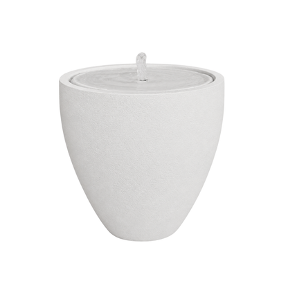 The Florastyle By Hingham Water Feature - Rustic Ellipse Small is a modern, white, round planter-style piece with smooth sides and a gentle stream of water bubbling from its center.