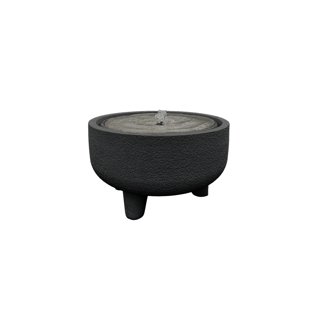 The Florastyle By Hingham Water Feature - Rustic Low is a round, black textured low-profile fountain with three short legs and a central bubbling spout, ideal as rustic garden décor and shown on a white background. Made from polyresin, durable and waterproof, yet lightweight. Suitable for indoor and outdoor spaces.
Colour: Lead
Price: R3145