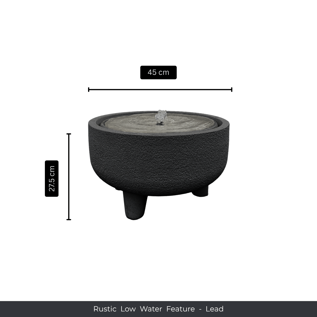 A round, rustic low-profile water feature by Florastyle By Hingham in lead color with three short legs, 45 cm wide and 27.5 cm tall. Center bubbles water gently. Label below: “Water Feature - Rustic Low”. Made from polyresin, durable and waterproof, yet lightweight. Suitable for indoor and outdoor spaces.
Colour: Lead
Price: R3145