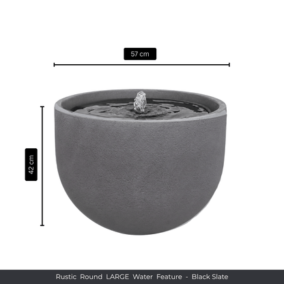 The Florastyle By Hingham Water Feature - Rustic Round is a large, round black slate patio fountain, 57 cm wide and 42 cm tall. It’s UV-resistant, with a small central fountain that adds rustic charm to any garden space. Made from polyresin, durable and waterproof, yet lightweight. Suitable for indoor and outdoor spaces.
Colour: Black Slate
Price: R3625