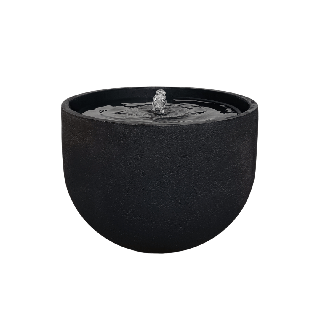 The Florastyle By Hingham Water Feature - Rustic Round is a minimalist black polyresin fountain with a round bowl, a gentle central stream, and UV resistance, adding subtle elegance to any space. Shown against a plain white background. Made from polyresin, durable and waterproof, yet lightweight. Suitable for indoor and outdoor spaces.
Colour: Lead
Price: R3625