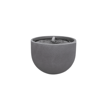 The Florastyle By Hingham Water Feature - Rustic Round is a modern gray polyresin garden fountain with a smooth surface. Water gently bubbles from the center, creating ripples on its UV-resistant design, shown against a plain white background. Made from polyresin, durable and waterproof, yet lightweight. Suitable for indoor and outdoor spaces.
Colour: Black Slate
Price: R1495