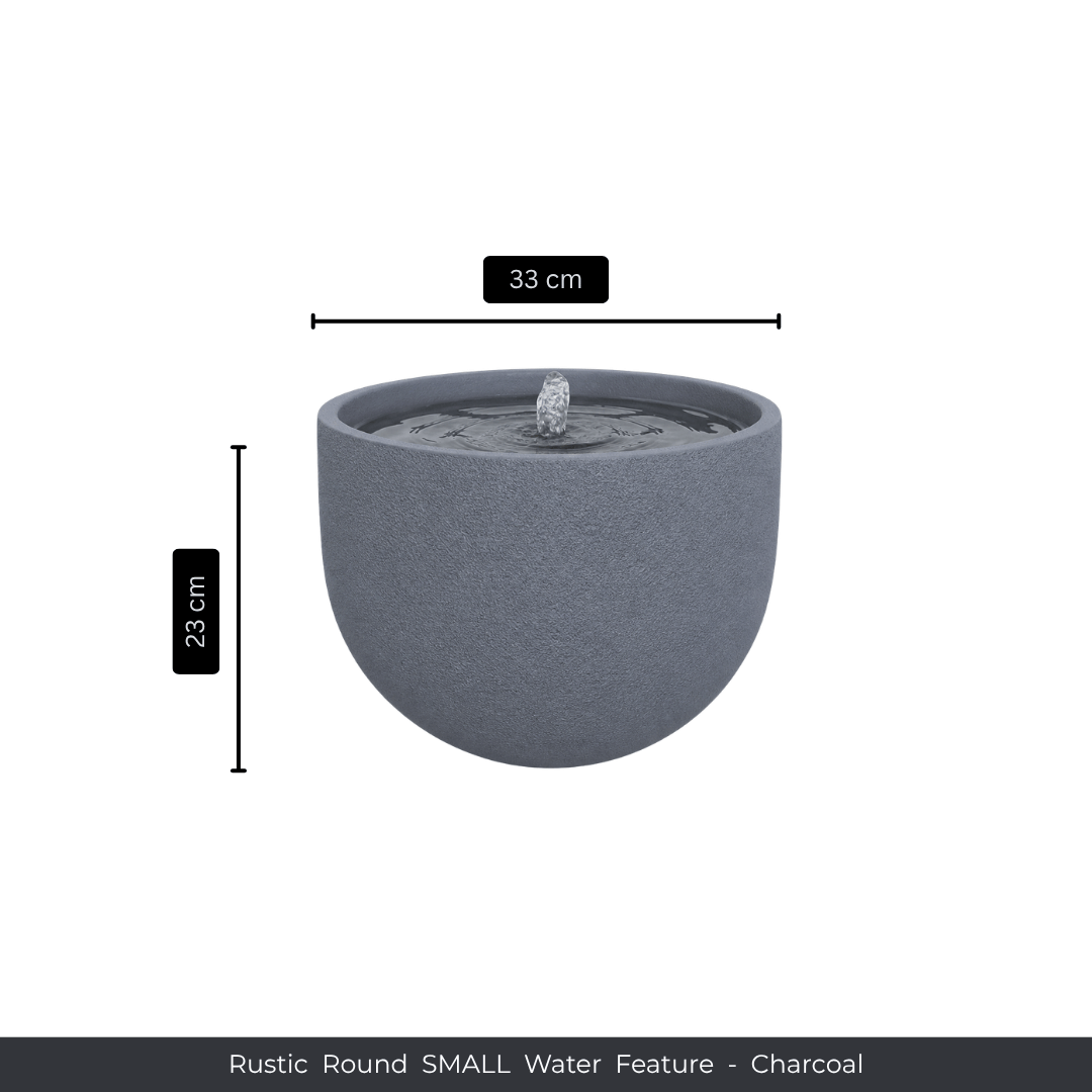 A small, round charcoal water feature by Florastyle By Hingham with gentle water flow from a central spout. Measures 33 cm wide, 23 cm tall. Text below: Water Feature - Rustic Round SMALL - Charcoal. Made from polyresin, durable and waterproof, yet lightweight. Suitable for indoor and outdoor spaces.
Colour: Charcoal
Price: R1495
