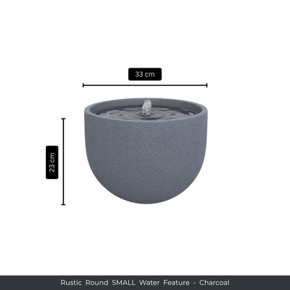 A small, round charcoal water feature by Florastyle By Hingham with gentle water flow from a central spout. Measures 33 cm wide, 23 cm tall. Text below: Water Feature - Rustic Round SMALL - Charcoal. Made from polyresin, durable and waterproof, yet lightweight. Suitable for indoor and outdoor spaces.
Colour: Charcoal
Price: R1495