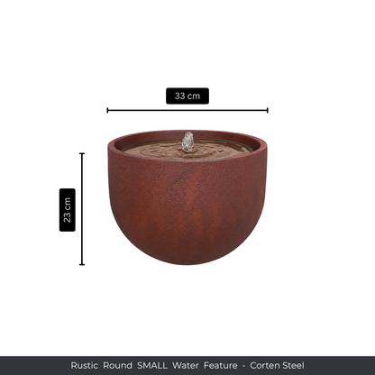 The Florastyle By Hingham Water Feature - Rustic Round is a corten steel piece measuring 33 cm wide by 23 cm tall, perfect for patios with its charming, gently bubbling center. Text: Rustic Round SMALL Water Feature - Corten Steel.