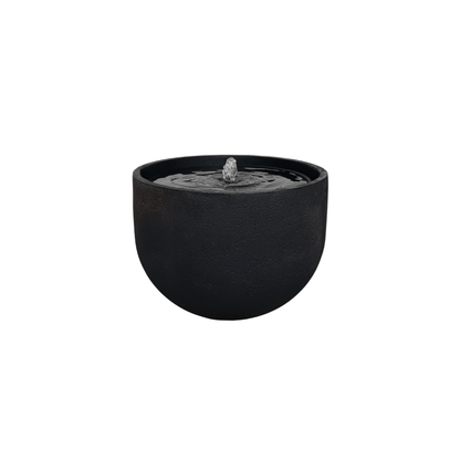 The Water Feature - Rustic Round by Florastyle By Hingham is a black, bowl-shaped polyresin garden fountain with water bubbling up from the center, shown against a white background. Made from polyresin, durable and waterproof, yet lightweight. Suitable for indoor and outdoor spaces.
Colour: Lead
Price: R1495