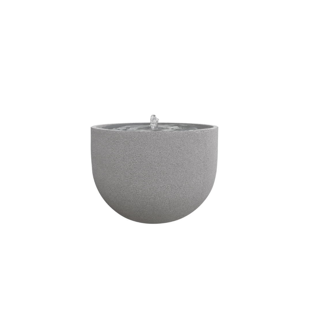 The Florastyle By Hingham Water Feature - Rustic Round is a minimalist, round, gray stone-look outdoor fountain with a smooth surface and central water spout, made from UV-resistant polyresin, shown on a white background. Made from polyresin, durable and waterproof, yet lightweight. Suitable for indoor and outdoor spaces.
Colour: Stone
Price: R1495