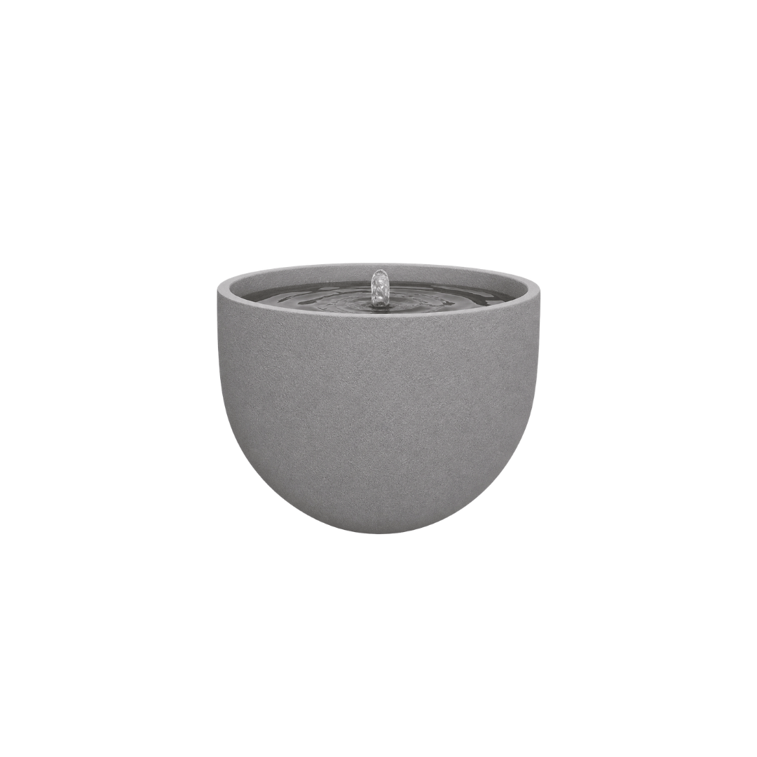 The Florastyle By Hingham Water Feature - Rustic Round is a modern, gray, UV-resistant polyresin fountain with a smooth, half-sphere design. Water bubbles gently from the center, creating ripples—perfect for any indoor or outdoor space. Made from polyresin, durable and waterproof, yet lightweight. Suitable for indoor and outdoor spaces.
Colour: Stone
Price: R1495