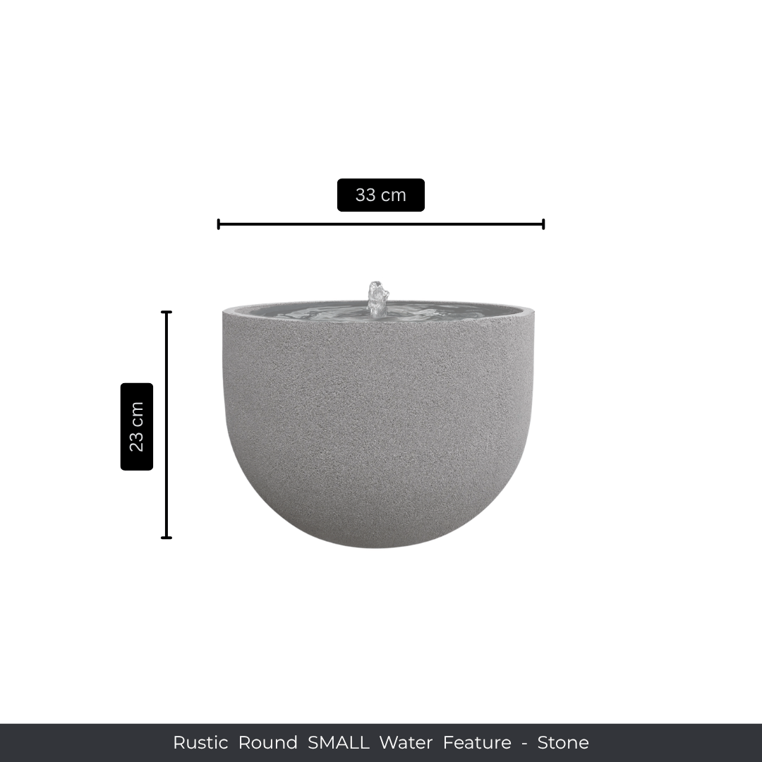 The Florastyle By Hingham Water Feature - Rustic Round is a small, round garden fountain (33 cm wide x 23 cm high) with water bubbling from the center, shown on a white background with product details underneath. Made from polyresin, durable and waterproof, yet lightweight. Suitable for indoor and outdoor spaces.
Colour: Stone
Price: R1495