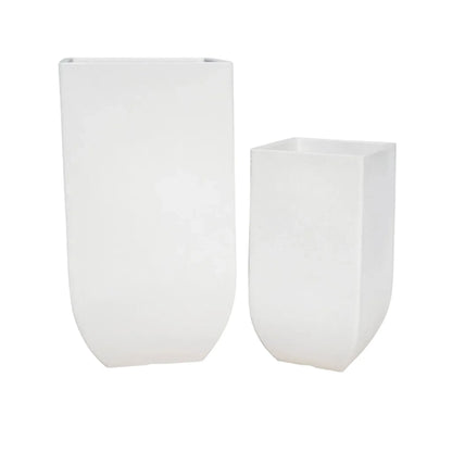 slight angled view of the small and large Japi verticale square planters side by side, tall, upright, off-white.