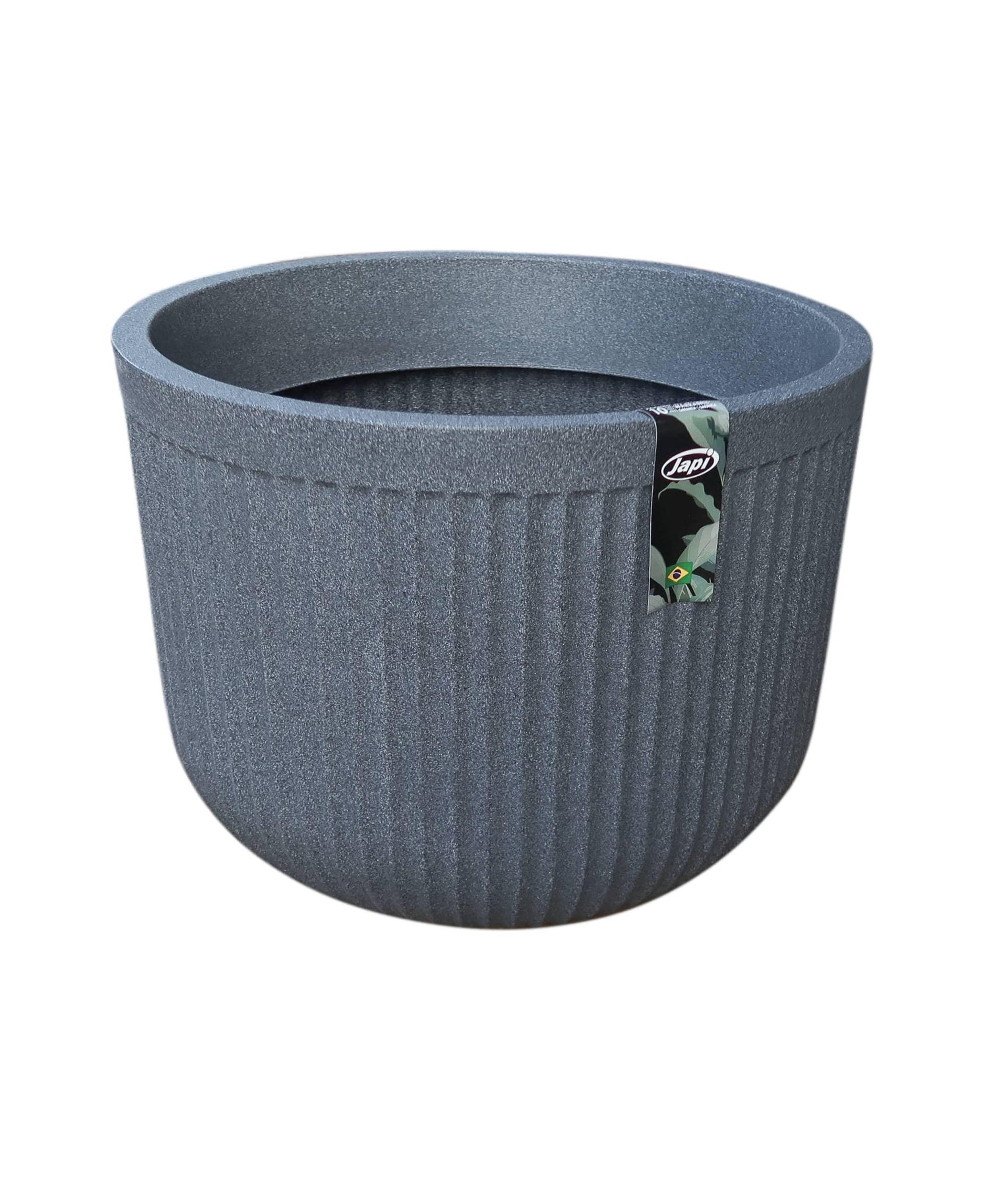 Slight angled view of the planter showing the side, inside rim and top opening.