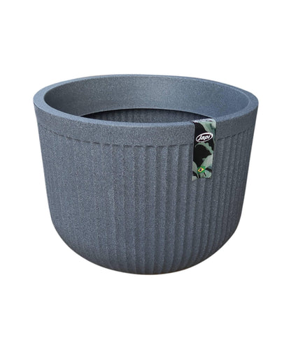 Slight angled view of the planter showing the side, inside rim and top opening.