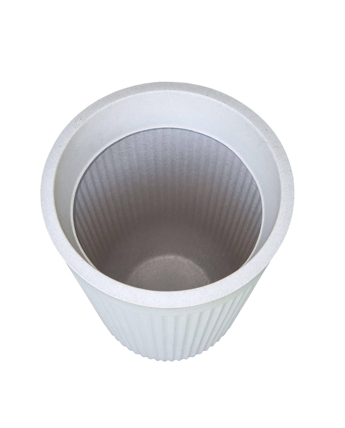 Aerial view into the tall flute planter by Japi showing the depth and the inside rim in the colour off white