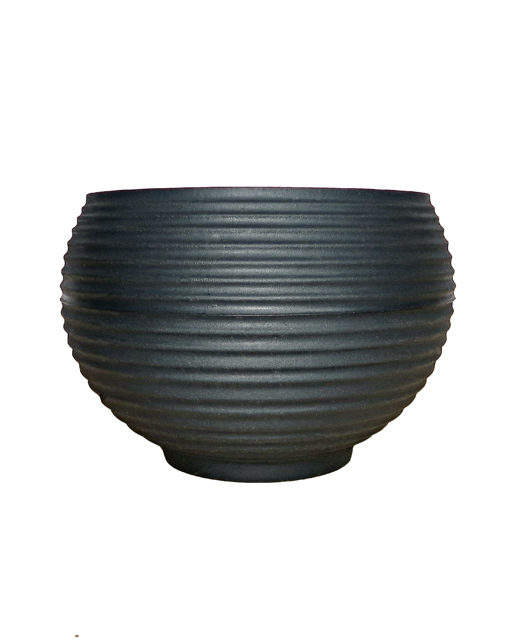 Side view of the round lattice Japi bowl showing the horizontal lines in the design. The bowl comes in one colour being Lead (black)