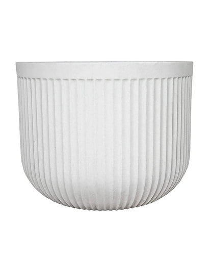 Side view of the planter showing off the unique fluted design in colour burnt cement.