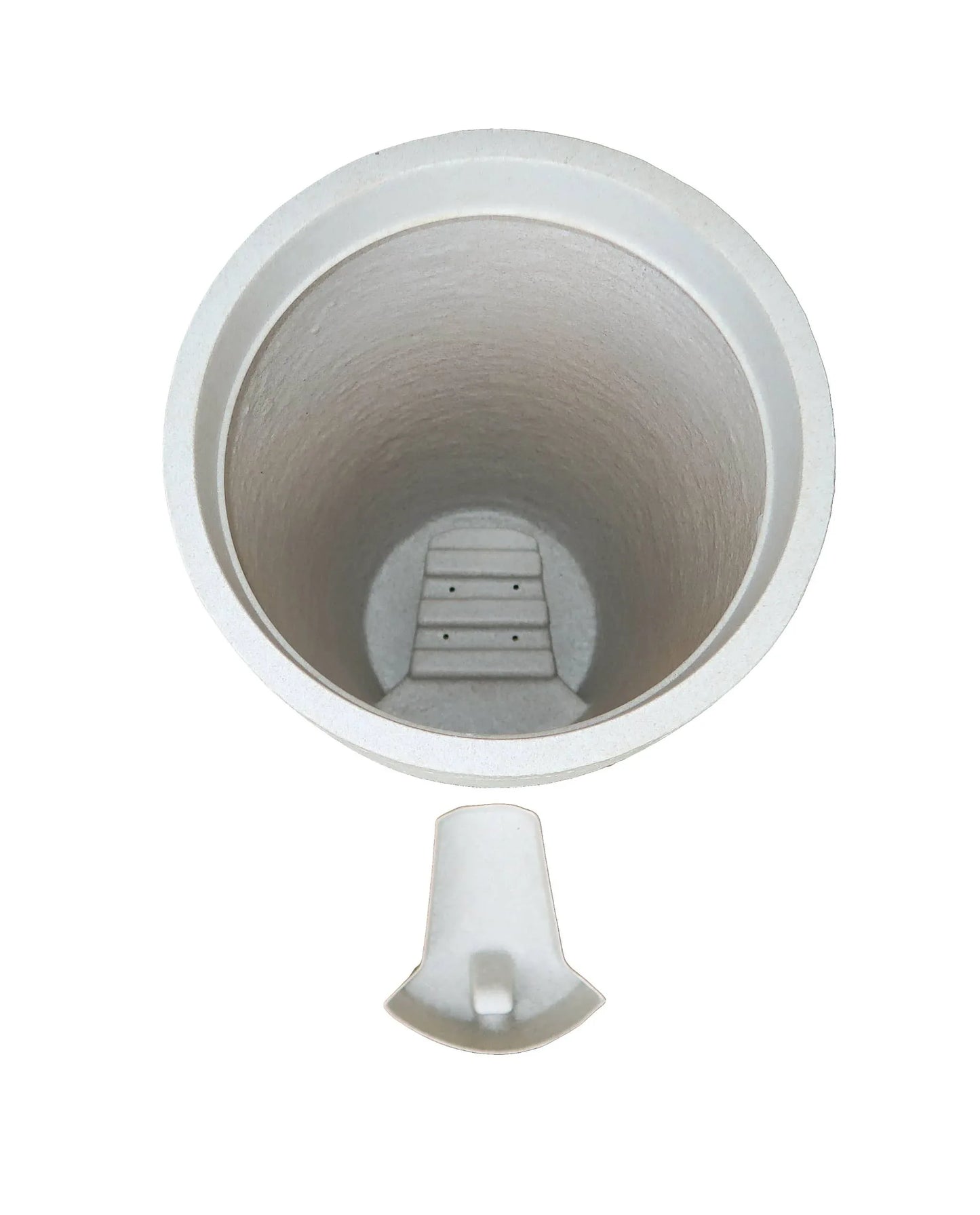 Aerial view showing the drip tray housing and the drip tray in a slide out position outside of the planter.