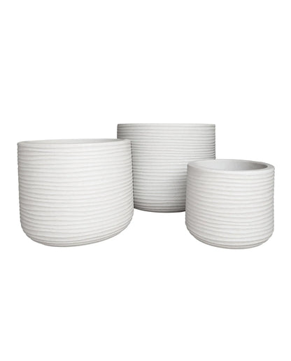 Stunning modern contemporary Lagoon Planters with a beautiful vertical pattern and smooth finish. A medium sized range that will add a fresh modern look anywhere. 