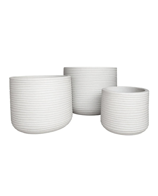 Stunning modern contemporary Lagoon Planters with a beautiful vertical pattern and smooth finish. A medium sized range that will add a fresh modern look anywhere. 